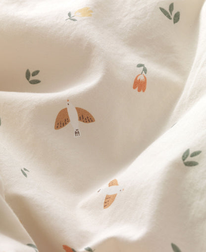 Housse de coussin à langer motif colombes, oiseaux chanteurs