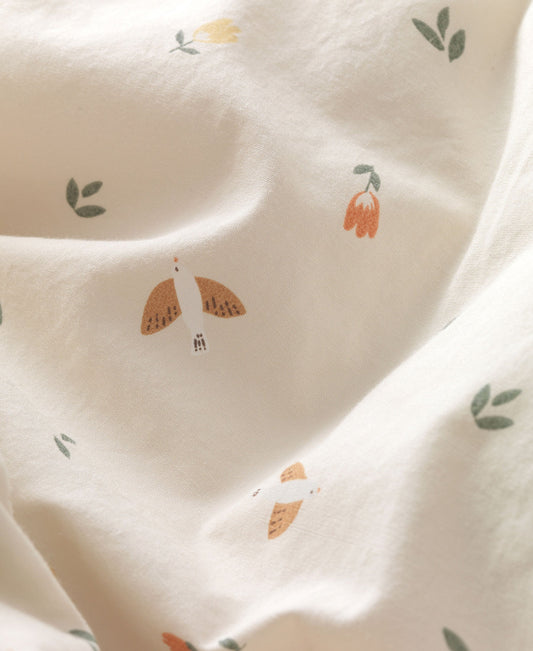Housse de coussin à langer motif colombes, oiseaux chanteurs